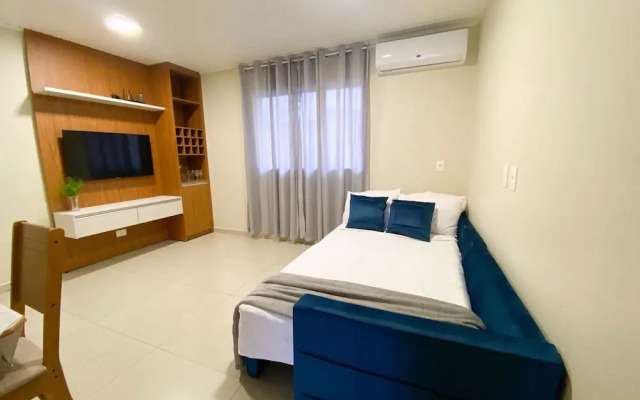 Casa com churrasqueira Ar e 2 quartos