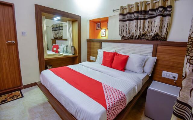 OYO 13553 Palm Residency