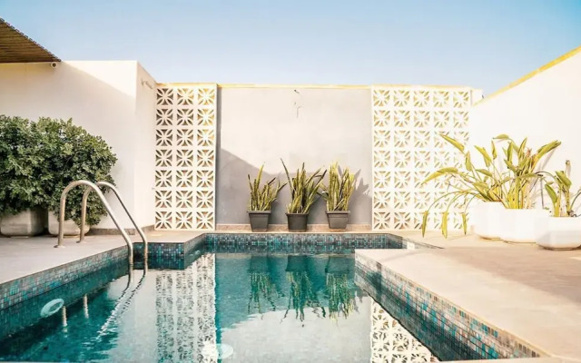 A pet Friendly Farmhouse With a Rooftop Pool