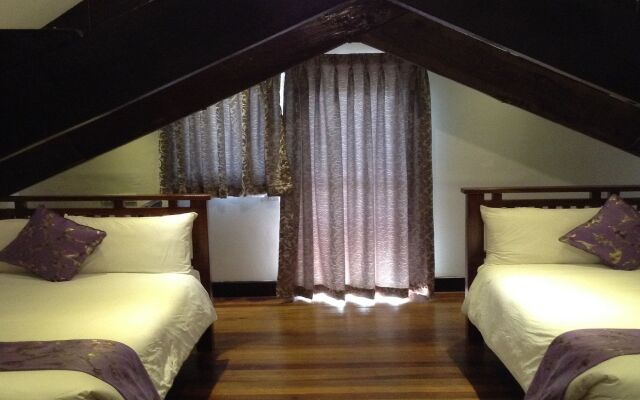 SAFARI LODGE BAGUIO by Log Cabin Hotel