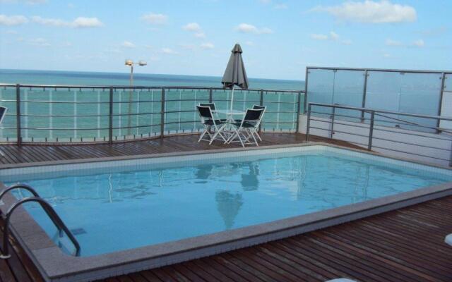 Flat à beira mar