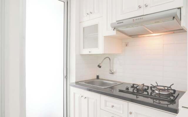 Restful 2Br Bassura City Apartment Near Shopping Mall