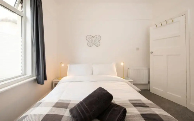 Absolute Beachfront With Decked Garden Oasis and Views