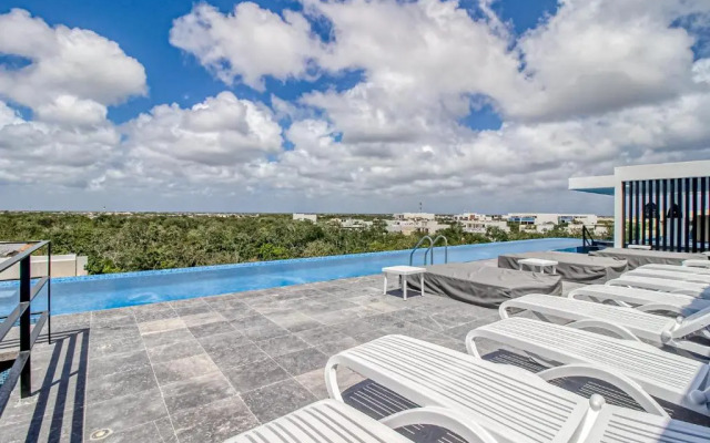 Mya Residence 206 at Aldea Zama