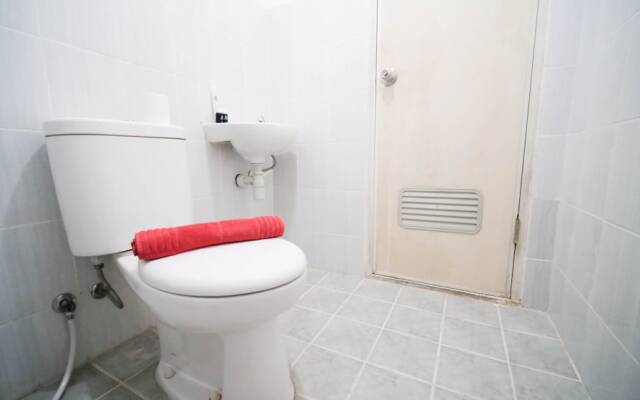 Cozy Living And Tidy 2Br At Puncak Dharmahusada Apartment