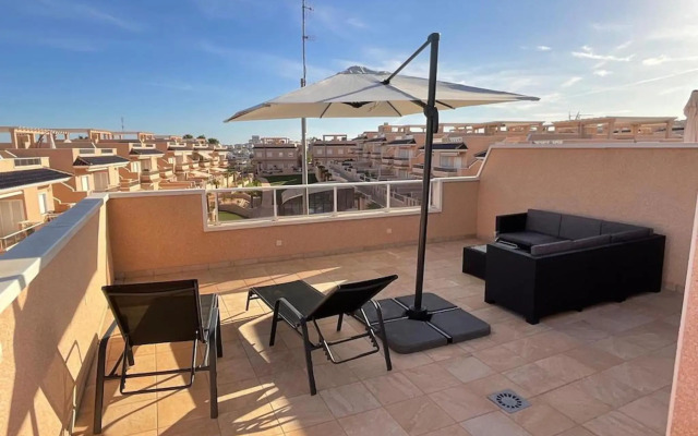 Penthouse Punta Prima Indoor & outdoor pool