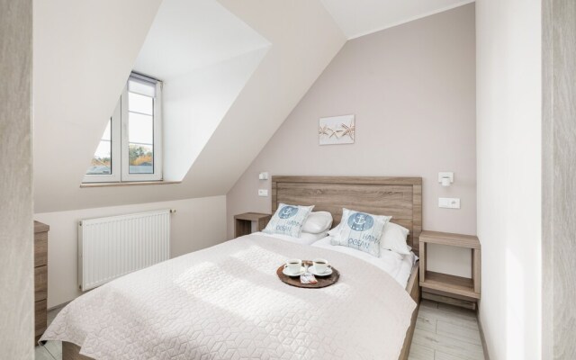 Nadbrzeżna Apartament by Renters