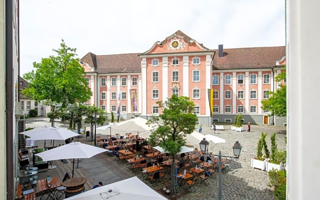 G¿ehaus am Schlossplatz, Z. 1