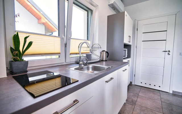 Apartamenty i Domki u Basi