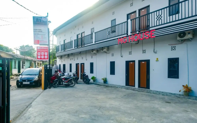 RedDoorz @ MG House Siantar Timur