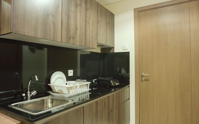 Cozy Studio Puri Orchard Apartment in Strategic Location