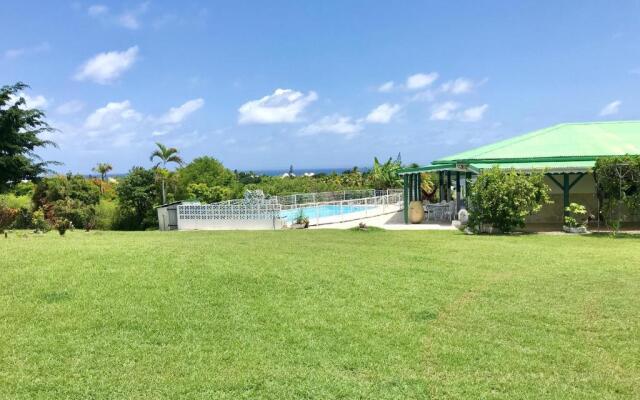 Maison de 4 chambres a Saint Francois a 300 m de la plage avec vue sur la mer piscine privee et jardin clos