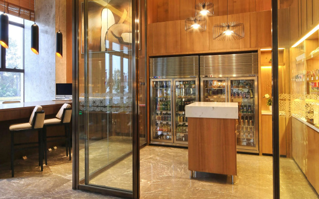 Отель Olympics Sports Center of Plum Garden