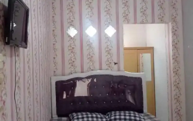 OYO 93192 Andesta Guest House SyariahNearAgrowisata Sungai Pinang Agro Nadin