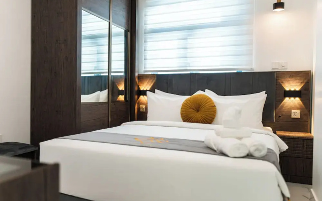 Aina Residency Beachfront Hotel