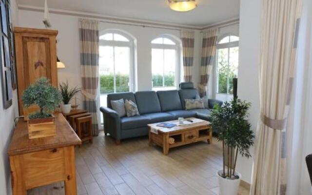 Kurparkresidenz Baabe - Ferienwohnung Meeresgarten mit Terrasse