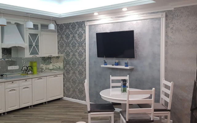 Апартаменты на Учительской 33