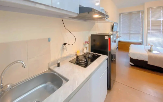 Homey And Good Place Studio At Tifolia Apartment