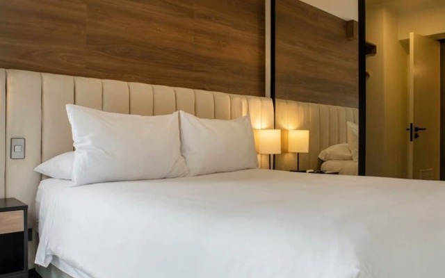 w Modern 1BR in Exclusive San Isidro