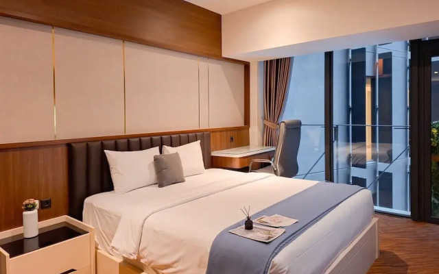 Modern Rustic Studio Apartment At Carstensz Residence