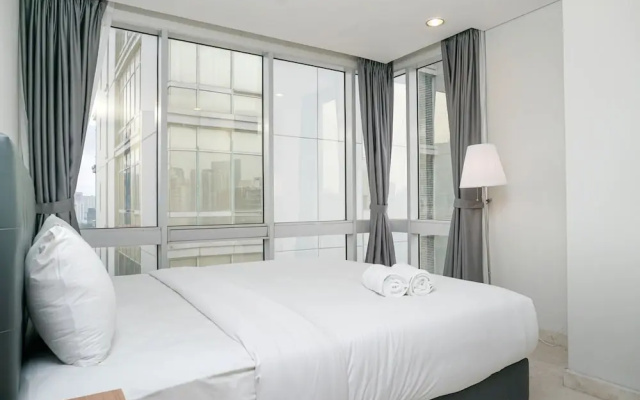 Comfortable Deluxe 2BR at The Empyreal Condominium Epicentrum Apartment By Travelio – Guest Rooms – Jakarta