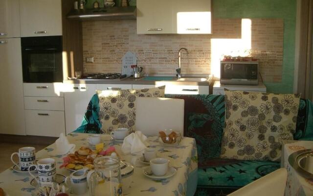 Room in Guest Room - S'olivariu Village Affittacamere - King Room With Roll-in Shower