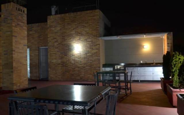 122 Plaza Apartahotel