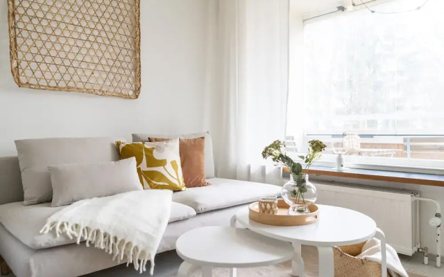 Upper floor studio with a balcony