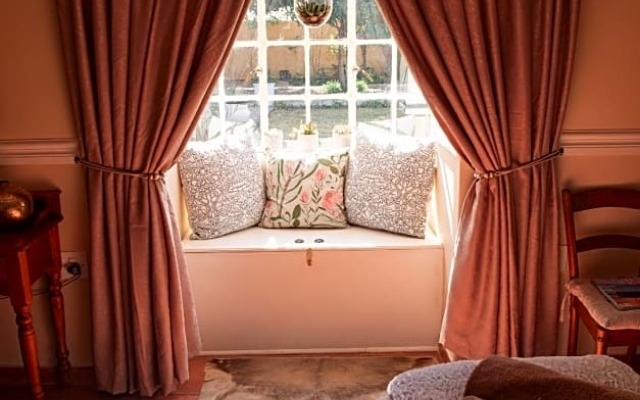 Roses And Pebbles B & B Guest House
