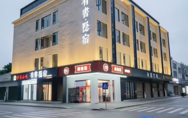 Lady in book — 2-star hotel in Dongguan