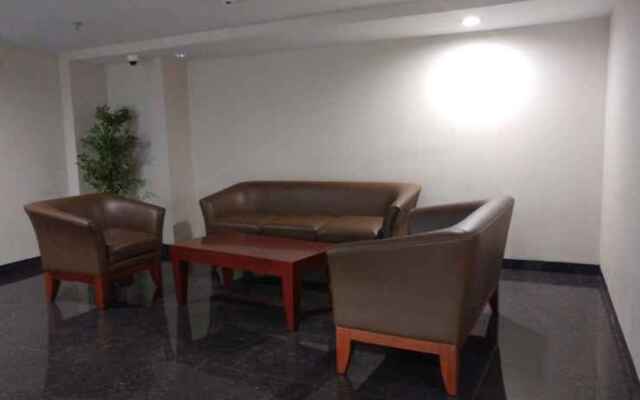 Modern White Studio At Springlake Summarecon Bekasi Apartment By Travelio