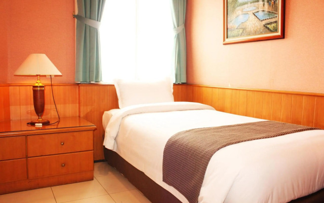 Travellers Suites Serviced Apartments