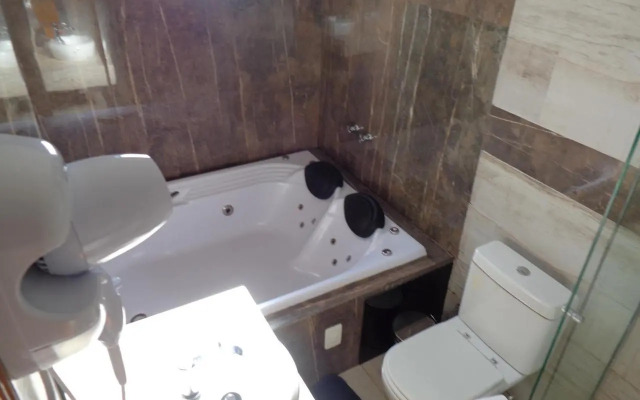 Monte Verde Inn Suítes com Hidromassagem dupla