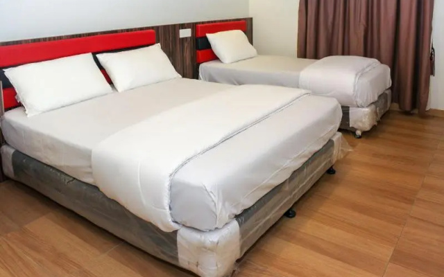 OYO 90027 Happy Hotel