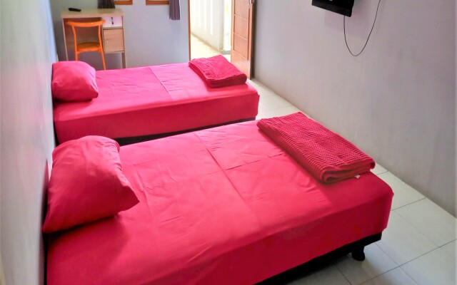 Nabila Syar i Guesthouse by ZUZU