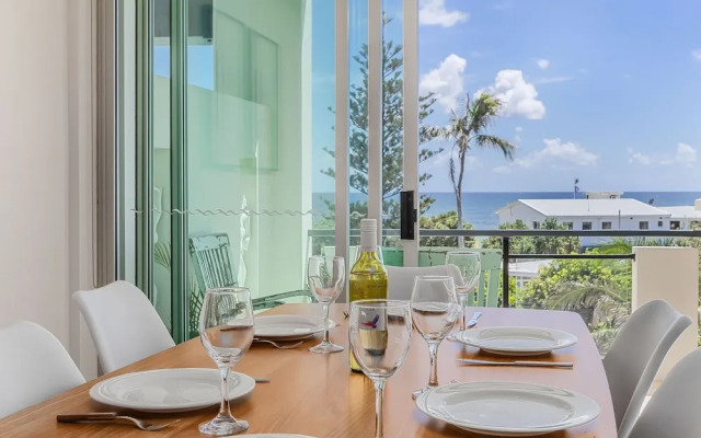 Luxe Oceanfront Haven with a Rooftop Spa