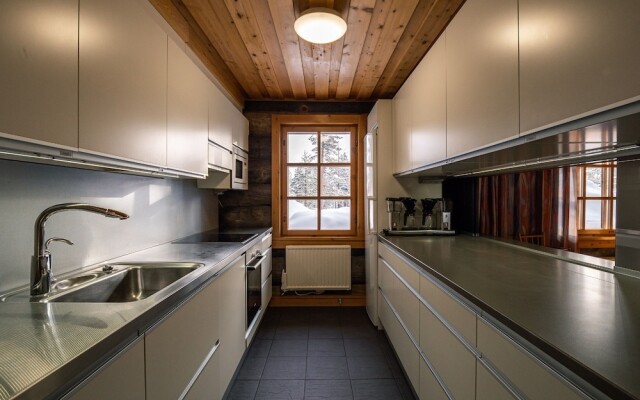 Saarikejo Log Chalet