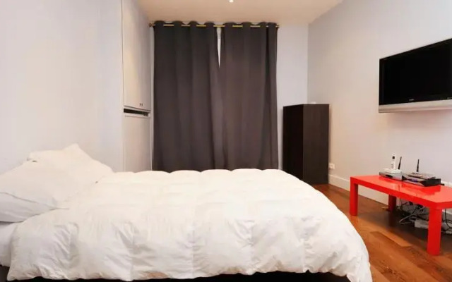 Studio charmant avec balcon et vue sur Tour Eiffel