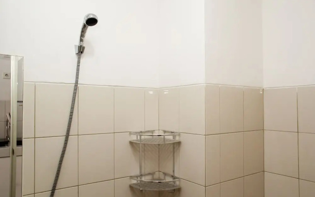 Chic and Cozy Studio at Riverview Jababeka Apartment