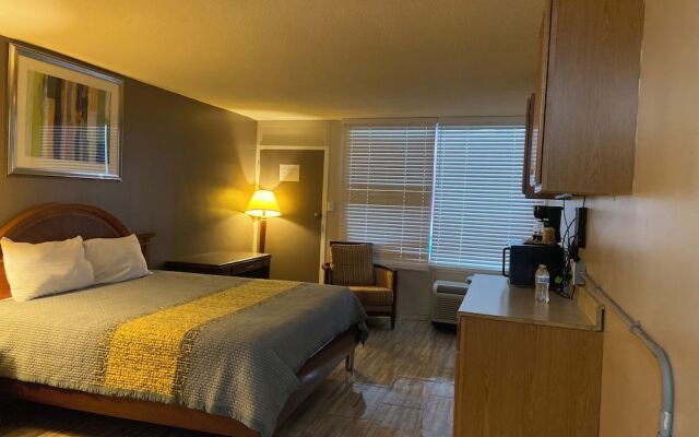 Apm Inn & Suites