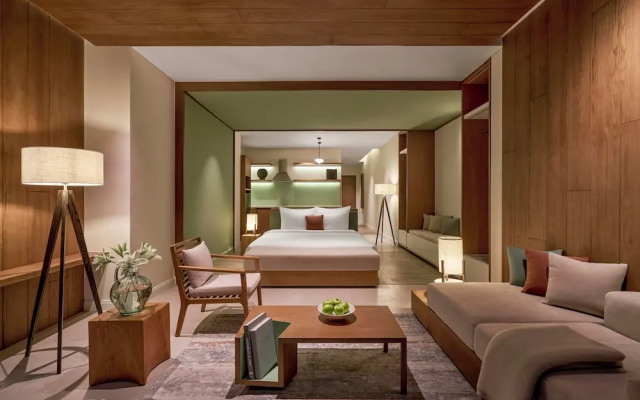 Signature By M Village Beachfront Hotel