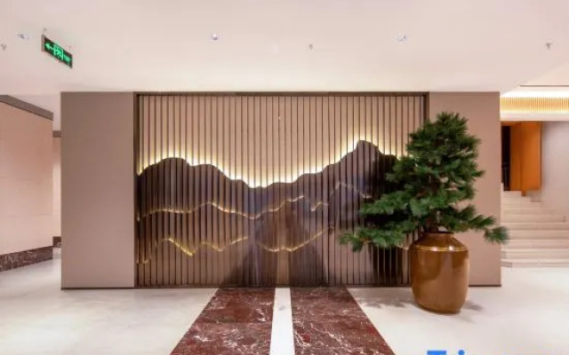 Kaimeix Hotel (Baojing Station Branch)