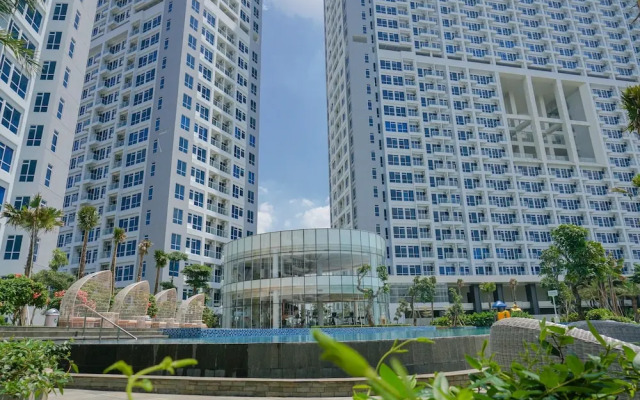 Modern with City View @ Studio Puri Mansion Apartment By Travelio