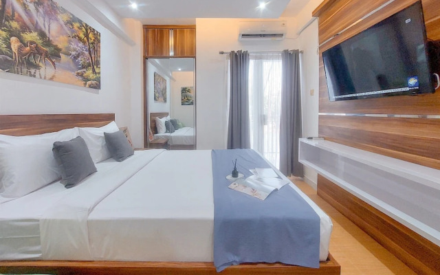 Comfy And Homey Studio At Sky View Apartment