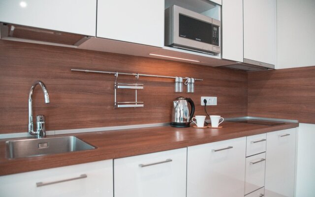 On Mitinskaya 16 Apartments