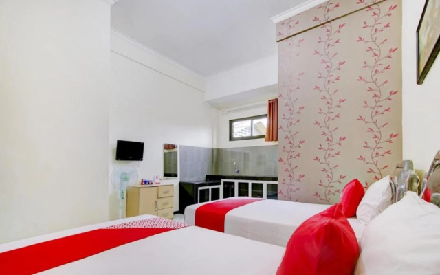 Capital O 90151 Guest House 180