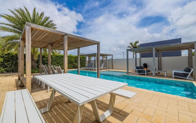 Serene Designer Gem Walk to Beach Strip Pool