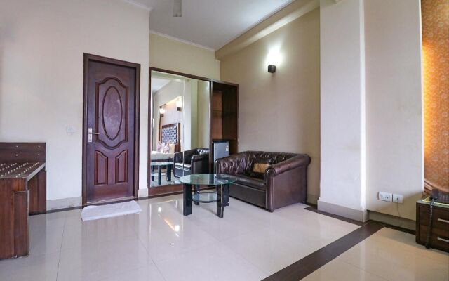 FabHotel Happy Residency