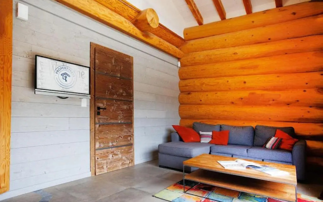 Original chalet en rondins, l'Ours Canadien