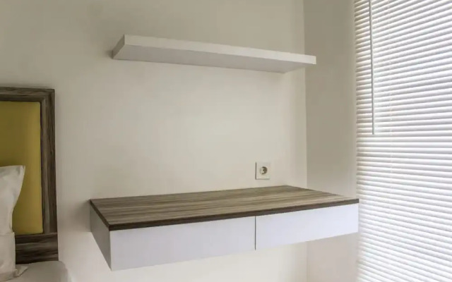Relaxing 2BR Apartment at M-Town Residence By Travelio